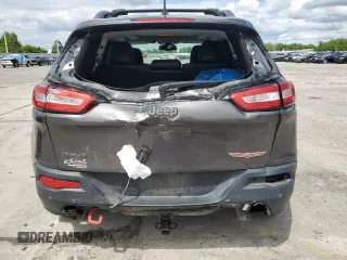 2018 Jeep Cherokee Trailhawk z VIN 1C4PJMBX1JD509120, wystawiony jako Copart lot #58920135 z przebiegiem 42 501 mil mil oraz Szkoda całkowita • Salvage title. Historia ofert i sprzedaży dostępna na DreamBid. Obrazek 6.