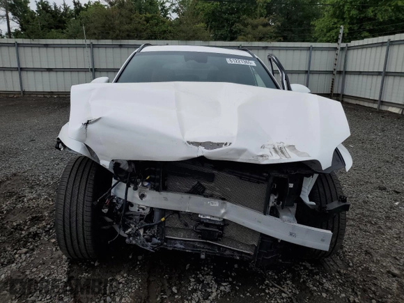 2023 Genesis GV70 2.5T with VIN KMUMADTB4PU103750, listed as a Copart auction lot 61221365 with 37,092 mi miles and Salvage title. Bid and sale history available at DreamBid. Image 5.