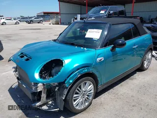 2017 MINI Convertible Cooper S z VIN WMWWG9C30H3C80917, wystawiony jako IAAI lot #42227320 z przebiegiem 38 490 mil mil oraz . Historia ofert i sprzedaży dostępna na DreamBid. Obrazek 20.