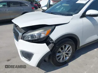 2018 Kia Sorento LX with VIN 5XYPG4A50JG350705, listed as a IAAI auction lot 41537305 with 82,346 mi miles and . Bid and sale history available at DreamBid. Image 6.