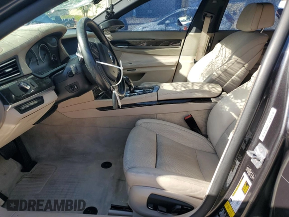 2013 BMW 7 Series 750Li xDrive with VIN WBAYF8C57DD140694, listed as a Copart auction lot 56983435 with 113,444 mi miles and Salvage title. Bid and sale history available at DreamBid. Image 7.