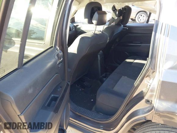 2014 Jeep Patriot Latitude with VIN 1C4NJPFB7ED856531, listed as a IAAI auction lot 41686649 with 107,889 mi miles and . Bid and sale history available at carsss.com. Image 8.