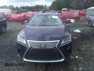 2017 Lexus RX with VIN 2T2ZZMCA4HC060546, listed as a IAAI auction lot 41734868 with 119,000 mi miles. Bid and sale history available at carsss.com. Image 12.