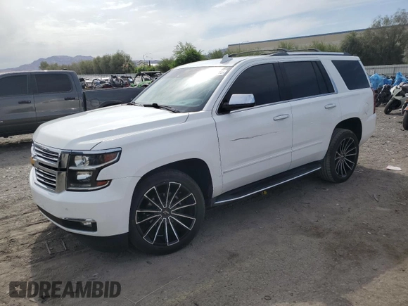 2018 Chevrolet Tahoe Premier with VIN 1GNSKCKC6JR195246, listed as a Copart auction lot 54887165 with 135,973 mi miles and Salvage title. Bid and sale history available at DreamBid. Image 1.