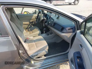 2010 Honda Insight EX with VIN JHMZE2H75AS027964, listed as a IAAI auction lot 41889301 with 136,485 mi miles and . Bid and sale history available at DreamBid. Image 5.