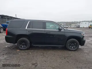 2015 Chevrolet Tahoe Commercial with VIN 1GNSK2EC8FR570602, listed as a IAAI auction lot 41977021 with 115,866 mi miles. Bid and sale history available at carsss.com. Image 13.