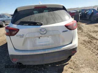 2016 Mazda CX-5 Grand Touring with VIN JM3KE4DYXG0781063, listed as a Copart auction lot 47099825 with 0 mi miles and Salvage Title. Bid and sale history available at carsss.com. Image 6.
