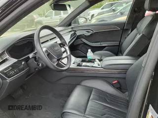 2021 Audi A8 z VIN WAU8EAF89MN003427, wystawiony jako IAAI lot #42455859 z przebiegiem 37 846 mil mil oraz . Historia ofert i sprzedaży dostępna na DreamBid. Obrazek 1.