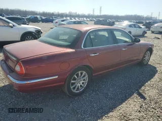 2005 Jaguar XJ Vanden Plas z VIN SAJWA82C75SG33074, wystawiony jako Copart lot #48725755 z przebiegiem 129 817 mil mil oraz Czysty tytuł • Clean title. Historia ofert i sprzedaży dostępna na DreamBid. Obrazek 3.