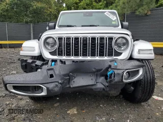 2024 Jeep Wrangler Sahara with VIN 1C4RJXP65RW210689, listed as a Copart auction lot 66482724 with 4,872 mi miles and Salvage Title. Bid and sale history available at DreamBid. Image 5.