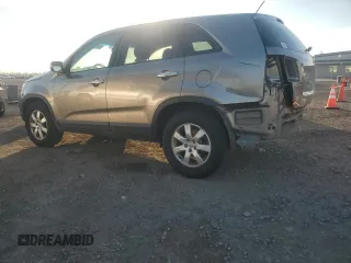 2012 Kia Sorento LX with VIN 5XYKTCA62CG255185, listed as a Copart auction lot 87242304 with 124,224 mi miles and Salvage Title. Bid and sale history available at DreamBid. Image 2.