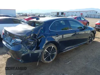 2020 Toyota Camry XSE with VIN 4T1K61AK0LU320375, listed as a IAAI auction lot 42126158 with 99,470 mi miles and . Bid and sale history available at DreamBid. Image 4.