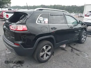 2021 Jeep Cherokee Limited z VIN 1C4PJMDX8MD121545, wystawiony jako IAAI lot #42706490 z przebiegiem 154 382 mil mil oraz . Historia ofert i sprzedaży dostępna na DreamBid. Obrazek 4.