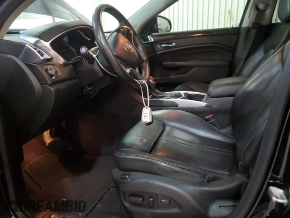 2016 Cadillac SRX Premium Collection с VIN 3GYFNDE35GS505972, выставлен на аукционе Copart как лот 79342004 с пробегом 166 238 миль миль и Чистый • Clean title. История ставок и продаж доступна на DreamBid. Изображение 7.