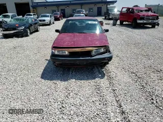 1991 Toyota Camry DLX z VIN 4T1SV21E4MU332100, wystawiony jako Copart lot #64645474 z przebiegiem 164 143 mil mil oraz Czysty tytuł • Clean title. Historia ofert i sprzedaży dostępna na DreamBid. Obrazek 11.
