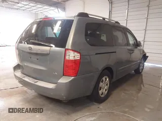 2009 Kia Sedona LX with VIN KNDMB233X96276905, listed as a IAAI auction lot 41394768 with 231,156 mi miles. Bid and sale history available at carsss.com. Image 4.