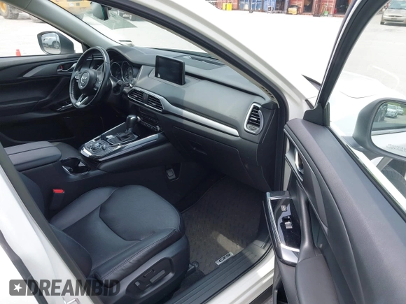 2019 Mazda CX-9 Touring with VIN JM3TCACY1K0334804, listed as a IAAI auction lot 42411662 with 49,447 mi miles and . Bid and sale history available at DreamBid. Image 5.