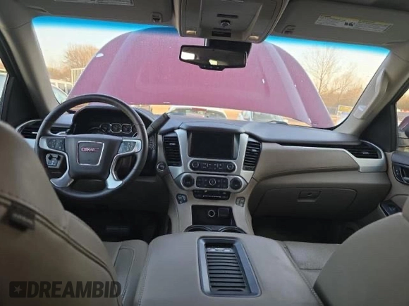 2016 GMC Yukon SLT with VIN 1GKS1BKC4GR346877, listed as a Copart auction lot 54334705 with 131,696 mi miles and Salvage Title. Bid and sale history available at carsss.com. Image 9.