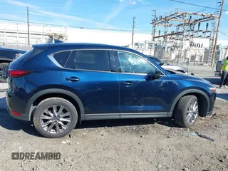 2020 Mazda CX-5 Grand Touring with VIN JM3KFBDM8L0807555, listed as a IAAI auction lot 41612906 with 40,518 mi miles. Bid and sale history available at carsss.com. Image 13.