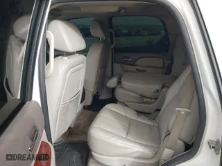 2009 GMC Yukon SLT w/4SB with VIN 1GKFC33009R149228, listed as a IAAI auction lot 41709590 with 212,227 mi miles. Bid and sale history available at carsss.com. Image 19.
