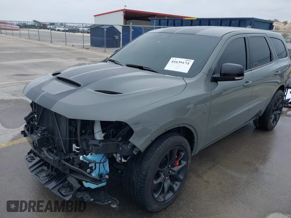 2021 Dodge Durango SRT Hellcat with VIN 1C4SDJH92MC605759, listed as a IAAI auction lot 41639174 with 4,800 mi miles and . Bid and sale history available at DreamBid. Image 21.