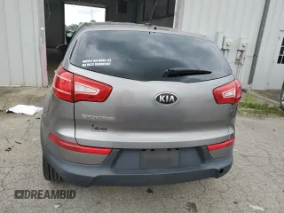 2013 Kia Sportage LX z VIN KNDPB3A25D7508794, wystawiony jako Copart lot #60145865 z przebiegiem 134 503 mil mil oraz Czysty tytuł • Clean title. Historia ofert i sprzedaży dostępna na DreamBid. Obrazek 6.
