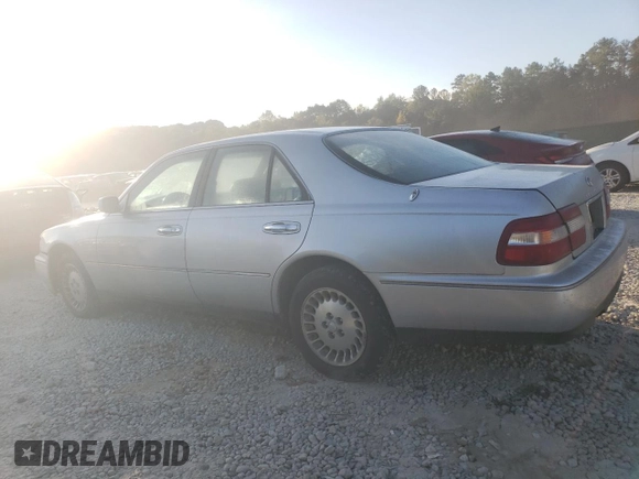 1998 Infiniti Q45 z VIN JNKBY31A9WM400536, wystawiony jako Copart lot #77225484 z przebiegiem 136 342 mil mil oraz Szkody całkowita. Historia ofert i sprzedaży dostępna na DreamBid. Obrazek 2.