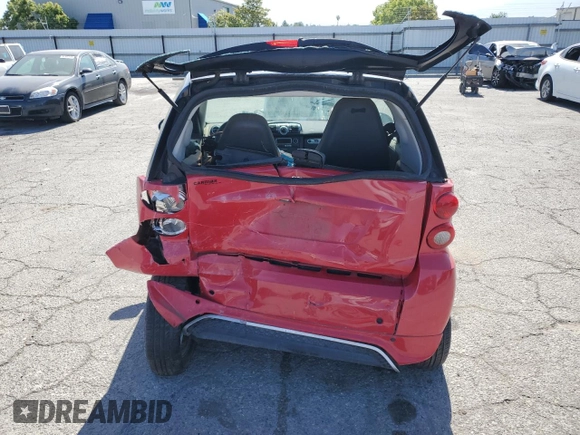 2014 Smart fortwo Pure z VIN WMEEJ3BA6EK745679, wystawiony jako Copart lot #56242784 z przebiegiem 86 991 mil mil oraz Szkoda całkowita • Salvage title. Historia ofert i sprzedaży dostępna na DreamBid. Obrazek 6.