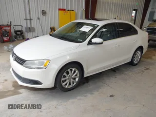 2013 Volkswagen Jetta SE with VIN 3VWDP7AJ0DM439860, listed as a IAAI auction lot 42145085 with 96,247 mi miles and . Bid and sale history available at DreamBid. Image 2.