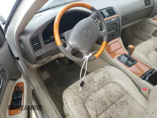 2000 Lexus LS 400 z VIN JT8BH28FXY0178613, wystawiony jako Copart lot #74883444 z przebiegiem Nie podano mil oraz Szkody całkowita. Historia ofert i sprzedaży dostępna na DreamBid. Obrazek 8.
