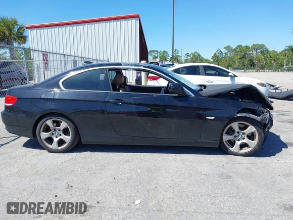 2010 BMW 3 Series 328i with VIN WBAWV1C58AP124385, listed as a IAAI auction lot 41761958 with 197,944 mi miles. Bid and sale history available at carsss.com. Image 14.
