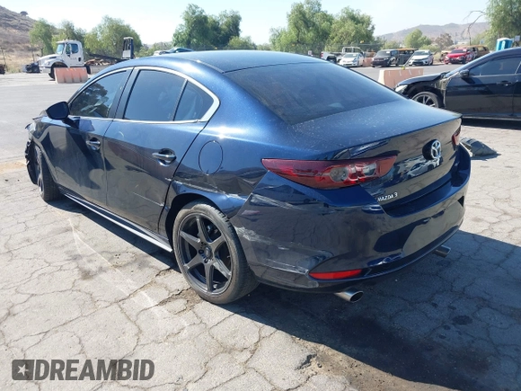 2021 Mazda 3 S with VIN JM1BPAALXM1326956, listed as a IAAI auction lot 42304248 with 55,104 mi miles and . Bid and sale history available at DreamBid. Image 3.