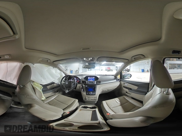 2014 Honda Odyssey Touring with VIN 5FNRL5H93EB079817, listed as a Copart auction lot 56231645 with 65,521 mi miles and Salvage title. Bid and sale history available at DreamBid. Image 15.