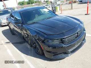 2016 Dodge Charger SXT with VIN 2C3CDXHG6GH146764, listed as a IAAI auction lot 42020618 with 154,693 mi miles and . Bid and sale history available at carsss.com. Image 1.