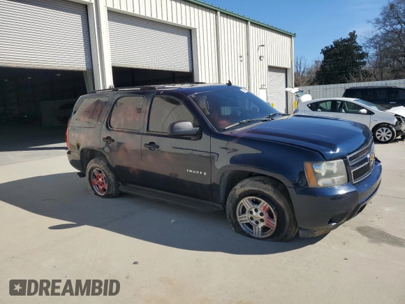 2007 Chevrolet Tahoe LS with VIN 1GNFC13J77J129067, listed as a Copart auction lot 42613505 with 293,775 mi miles and Salvage title. Bid and sale history available at DreamBid. Image 4.