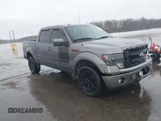 2013 Ford F-150 XL with VIN 1FTFW1EF0DFA14155, listed as a IAAI auction lot 41216268 with 207,889 mi miles. Bid and sale history available at carsss.com. Image 1.