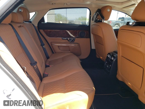 2019 Jaguar XJ Portfolio with VIN SAJWA2G72K8W21087, listed as a Copart auction lot 66017344 with 22,671 mi miles and Salvage Title. Bid and sale history available at DreamBid. Image 10.