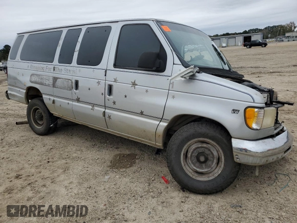 1999 Ford Econoline Passenger XL with VIN 1FBSS31L2XHB54786, listed as a Copart auction lot 80025474 with 418,665 mi miles and Clean Title. Bid and sale history available at DreamBid. Image 4.