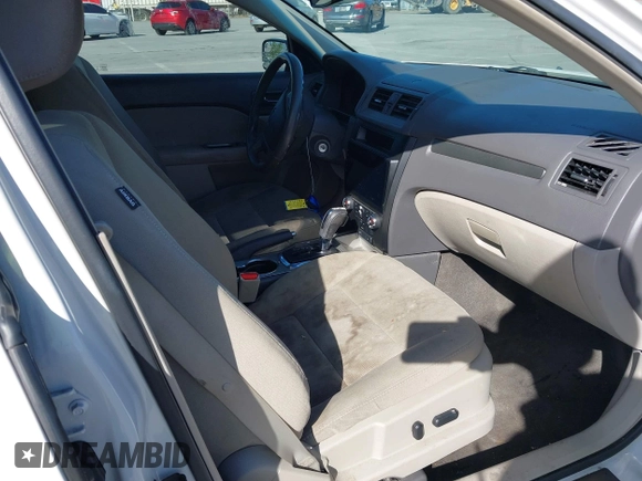 2012 Ford Fusion Hybrid z VIN 3FADP0L3XCR276182, wystawiony jako IAAI lot #42260450 z przebiegiem 133 567 mil mil oraz . Historia ofert i sprzedaży dostępna na DreamBid. Obrazek 5.