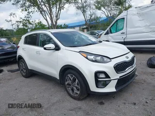 2021 Kia Sportage EX with VIN KNDPN3AC5M7856515, listed as a IAAI auction lot 41879128 with 56,537 mi miles and . Bid and sale history available at DreamBid. Image 1.