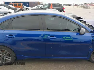 2021 Kia Forte GT-Line with VIN 3KPF34AD3ME403218, listed as a IAAI auction lot 42375319 with 56,621 mi miles and . Bid and sale history available at DreamBid. Image 14.