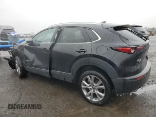 2021 Mazda CX-30 Premium with VIN 3MVDMBDL5MM300964, listed as a Copart auction lot 50311915 with 59,914 mi miles and Salvage Title. Bid and sale history available at carsss.com. Image 2.