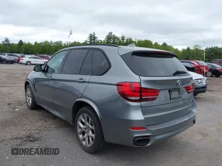 2014 BMW X5 xDrive50i with VIN 5UXKR6C54E0C02423, listed as a IAAI auction lot 42278044 with 122,370 mi miles and . Bid and sale history available at DreamBid. Image 3.
