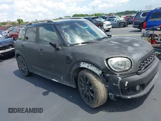2018 MINI Countryman Cooper S z VIN WMZYT3C35J3E00804, wystawiony jako IAAI lot #42194381 z przebiegiem 101 634 mil mil oraz . Historia ofert i sprzedaży dostępna na DreamBid. Obrazek 6.