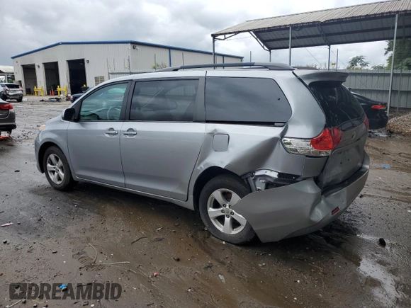 2012 Toyota Sienna LE AAS with VIN 5TDKK3DC8CS224112, listed as a Copart auction lot 59701725 with 200,726 mi miles and Salvage title. Bid and sale history available at DreamBid. Image 2.
