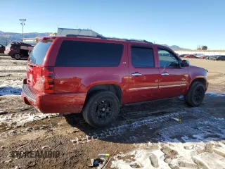2014 Chevrolet Suburban LTZ with VIN 1GNSCKE08ER168239, listed as a Copart auction lot 42143915 with 137,902 mi miles and Salvage title. Bid and sale history available at DreamBid. Image 3.