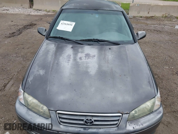 2000 Toyota Camry CE z VIN JT2BG22K3Y0530823, wystawiony jako IAAI lot #42365050 z przebiegiem 148 913 mil mil oraz . Historia ofert i sprzedaży dostępna na DreamBid. Obrazek 6.