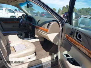 1999 Lincoln Continental with VIN 1LNHM97V8XY686521, listed as a IAAI auction lot 41681027 with 144,407 mi miles. Bid and sale history available at carsss.com. Image 5.
