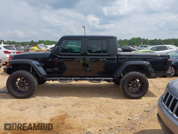 2021 Jeep Gladiator Willys with VIN 1C6HJTAG7ML514114, listed as a IAAI auction lot 42399793 with 78,829 mi miles and . Bid and sale history available at DreamBid. Image 14.