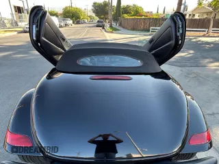 2000 Plymouth Prowler z VIN 1P3EW65G6YV602347, wystawiony jako Copart lot #71067714 z przebiegiem 65 554 mil mil oraz Tytuł czysty. Historia ofert i sprzedaży dostępna na DreamBid. Obrazek 2.